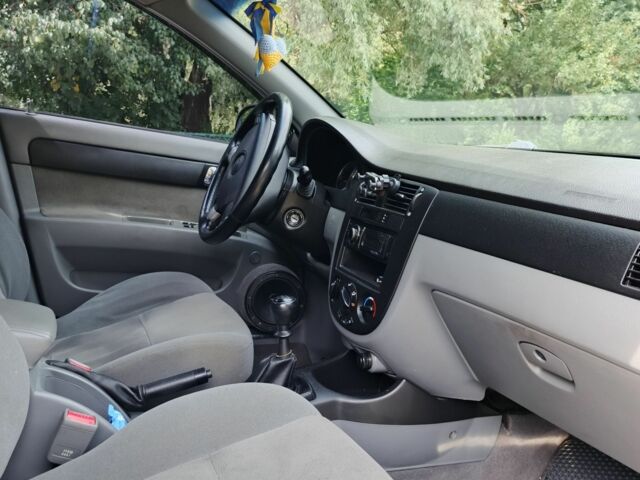 Черный Шевроле Лачетти, объемом двигателя 1.8 л и пробегом 190 тыс. км за 4999 $, фото 11 на Automoto.ua