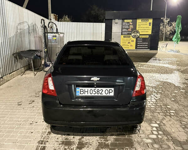 Черный Шевроле Лачетти, объемом двигателя 1.8 л и пробегом 296 тыс. км за 5300 $, фото 5 на Automoto.ua