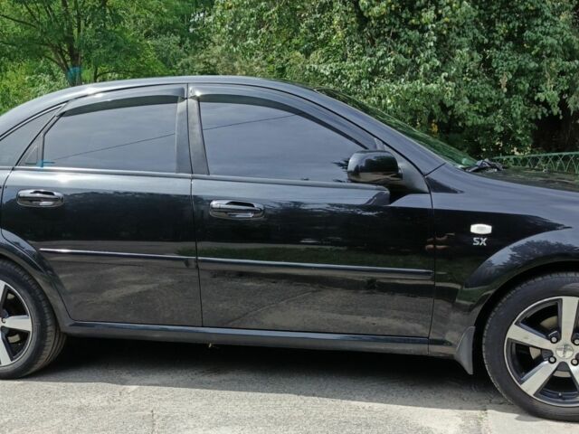 Черный Шевроле Лачетти, объемом двигателя 1.8 л и пробегом 190 тыс. км за 4999 $, фото 6 на Automoto.ua