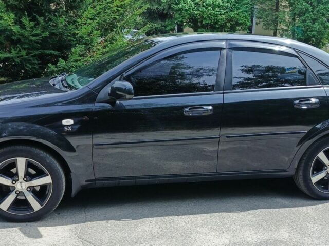 Черный Шевроле Лачетти, объемом двигателя 1.8 л и пробегом 190 тыс. км за 4999 $, фото 10 на Automoto.ua