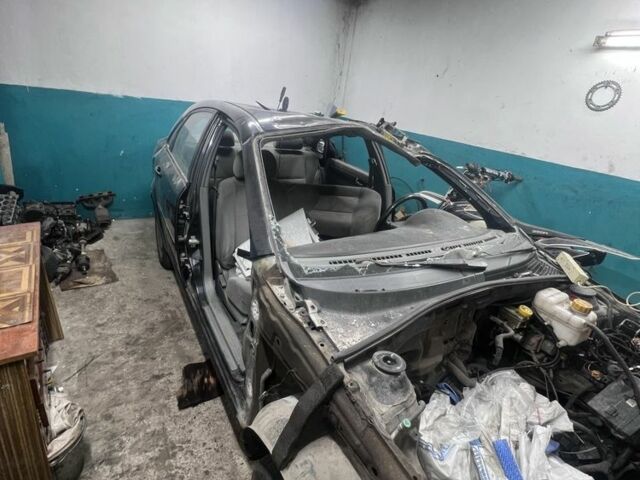 Черный Шевроле Лачетти, объемом двигателя 1.8 л и пробегом 300 тыс. км за 1000 $, фото 1 на Automoto.ua