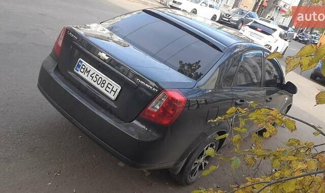 Черный Шевроле Лачетти, объемом двигателя 1.8 л и пробегом 185 тыс. км за 4999 $, фото 6 на Automoto.ua