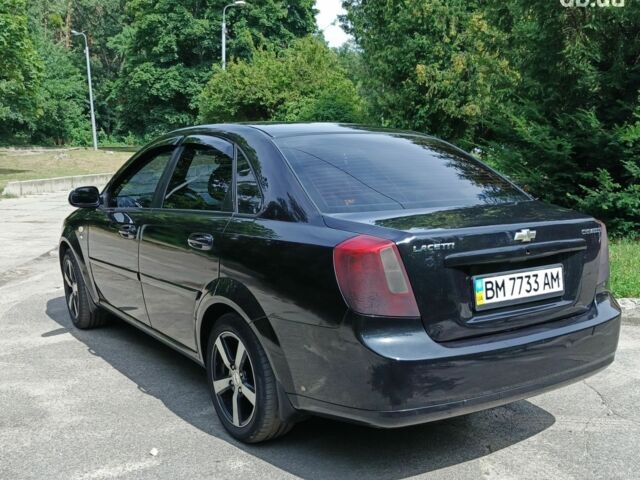 Черный Шевроле Лачетти, объемом двигателя 1.8 л и пробегом 190 тыс. км за 4999 $, фото 14 на Automoto.ua