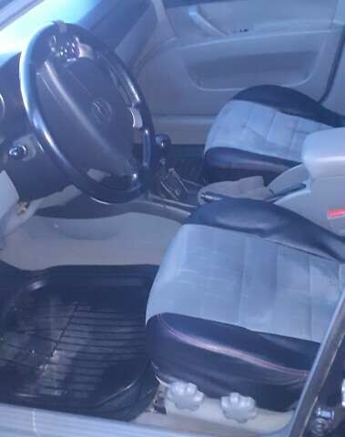 Черный Шевроле Лачетти, объемом двигателя 1.8 л и пробегом 185 тыс. км за 4999 $, фото 9 на Automoto.ua