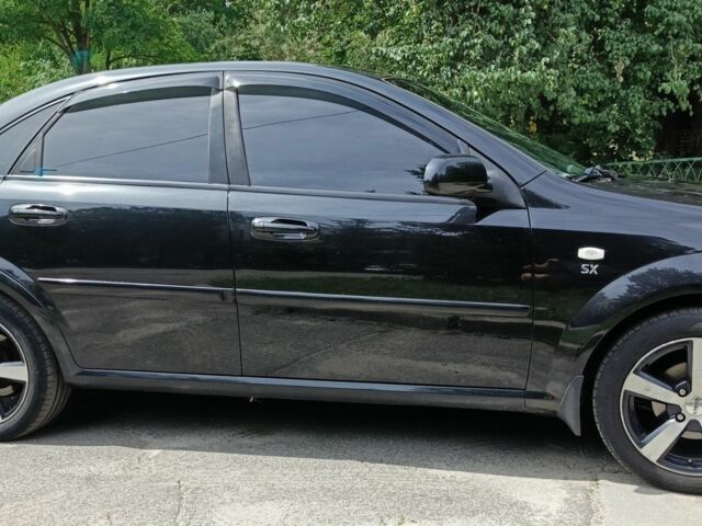 Черный Шевроле Лачетти, объемом двигателя 1.8 л и пробегом 190 тыс. км за 4999 $, фото 16 на Automoto.ua