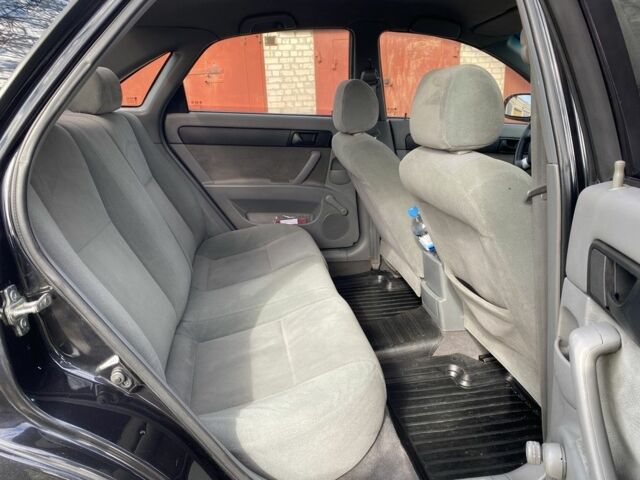 Чорний Шевроле Лачетті, об'ємом двигуна 1.6 л та пробігом 240 тис. км за 4450 $, фото 10 на Automoto.ua