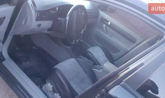 Черный Шевроле Лачетти, объемом двигателя 1.8 л и пробегом 185 тыс. км за 4999 $, фото 12 на Automoto.ua