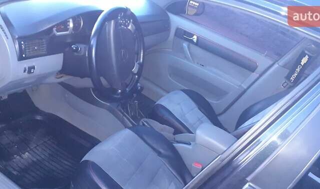 Черный Шевроле Лачетти, объемом двигателя 1.8 л и пробегом 185 тыс. км за 4999 $, фото 8 на Automoto.ua