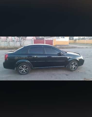 Черный Шевроле Лачетти, объемом двигателя 1.8 л и пробегом 185 тыс. км за 4999 $, фото 1 на Automoto.ua