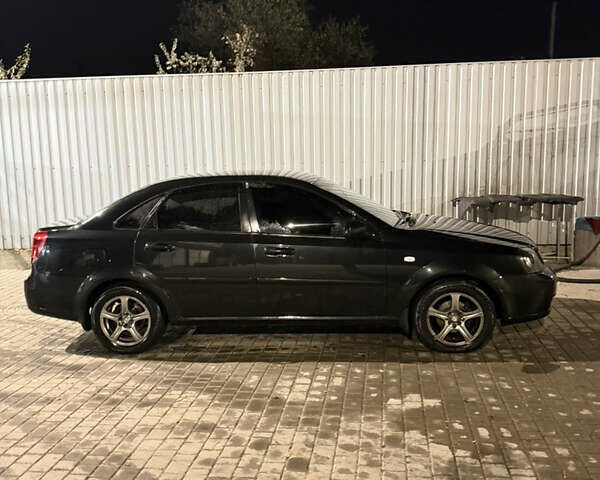 Черный Шевроле Лачетти, объемом двигателя 1.8 л и пробегом 296 тыс. км за 5300 $, фото 6 на Automoto.ua