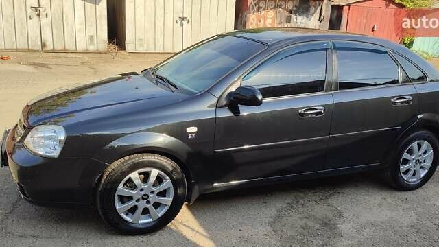 Черный Шевроле Лачетти, объемом двигателя 1.8 л и пробегом 92 тыс. км за 7100 $, фото 6 на Automoto.ua