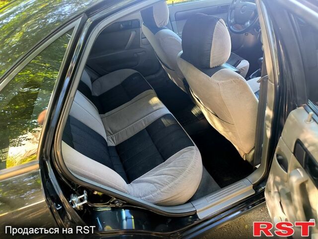 Черный Шевроле Лачетти, объемом двигателя 1.6 л и пробегом 179 тыс. км за 5300 $, фото 8 на Automoto.ua