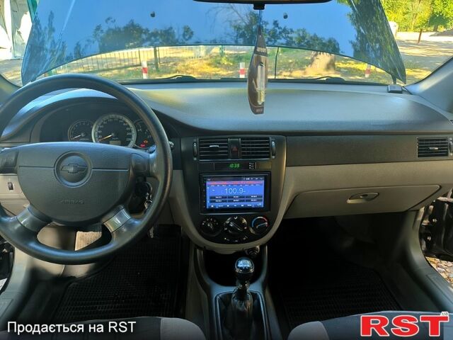 Черный Шевроле Лачетти, объемом двигателя 1.6 л и пробегом 179 тыс. км за 5300 $, фото 10 на Automoto.ua