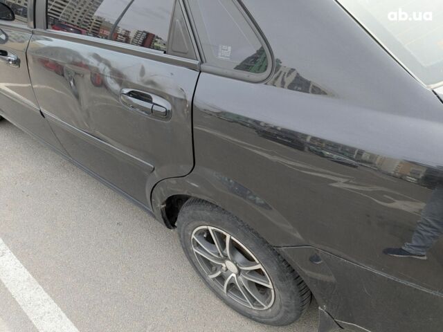 Черный Шевроле Лачетти, объемом двигателя 1.6 л и пробегом 221 тыс. км за 5900 $, фото 1 на Automoto.ua