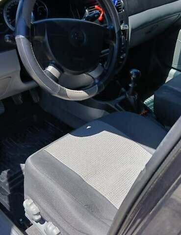 Чорний Шевроле Лачетті, об'ємом двигуна 1.8 л та пробігом 82 тис. км за 7500 $, фото 9 на Automoto.ua