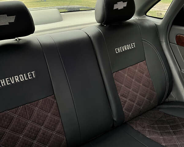 Черный Шевроле Лачетти, объемом двигателя 1.6 л и пробегом 145 тыс. км за 5250 $, фото 27 на Automoto.ua