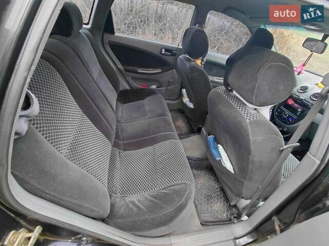 Черный Шевроле Лачетти, объемом двигателя 1.8 л и пробегом 235 тыс. км за 3300 $, фото 9 на Automoto.ua