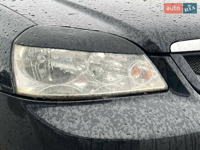 Черный Шевроле Лачетти, объемом двигателя 1.8 л и пробегом 293 тыс. км за 4190 $, фото 12 на Automoto.ua