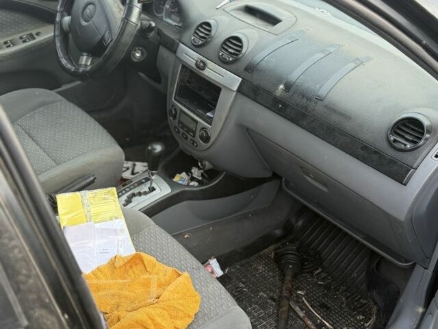 Черный Шевроле Лачетти, объемом двигателя 2 л и пробегом 200 тыс. км за 1300 $, фото 4 на Automoto.ua