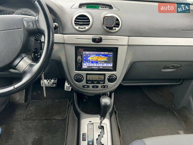 Черный Шевроле Лачетти, объемом двигателя 1.8 л и пробегом 293 тыс. км за 4190 $, фото 20 на Automoto.ua