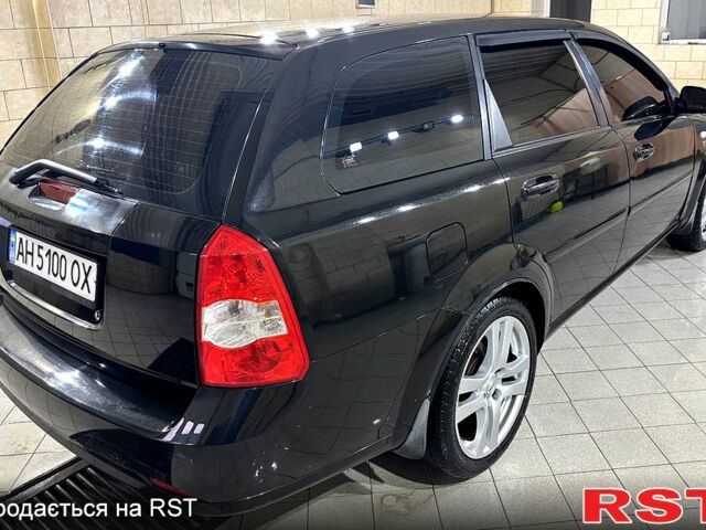 Черный Шевроле Лачетти, объемом двигателя 1.8 л и пробегом 320 тыс. км за 4000 $, фото 2 на Automoto.ua