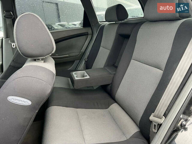 Черный Шевроле Лачетти, объемом двигателя 1.8 л и пробегом 293 тыс. км за 4190 $, фото 33 на Automoto.ua