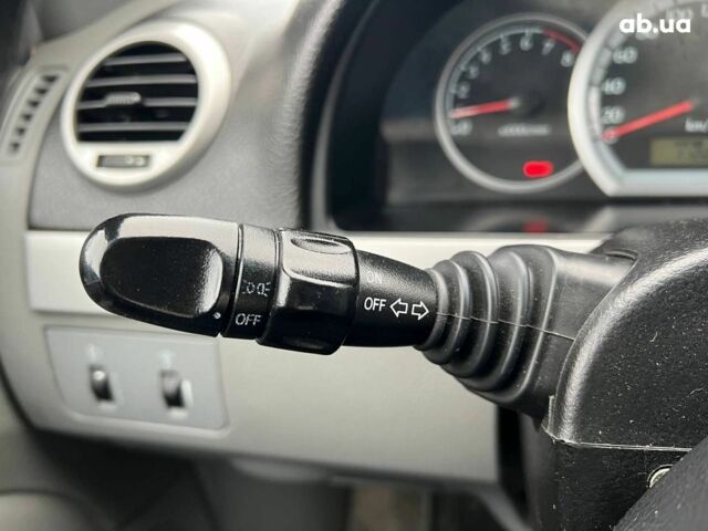 Черный Шевроле Лачетти, объемом двигателя 1.8 л и пробегом 293 тыс. км за 4190 $, фото 29 на Automoto.ua