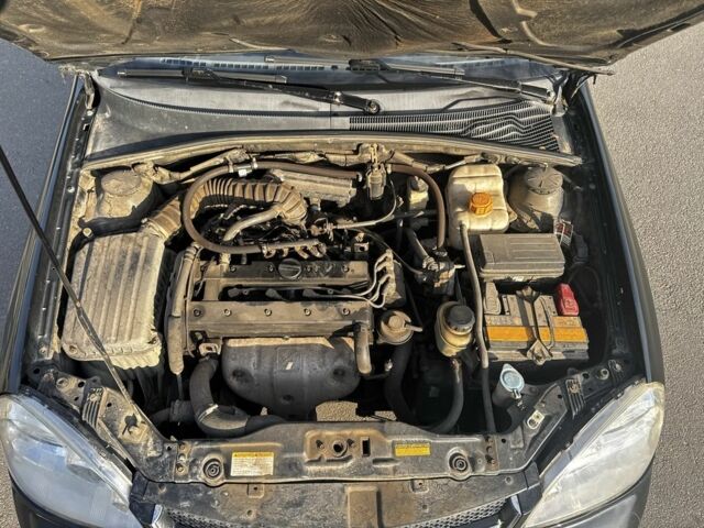 Черный Шевроле Лачетти, объемом двигателя 1.8 л и пробегом 334 тыс. км за 3600 $, фото 7 на Automoto.ua