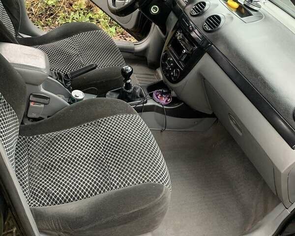 Черный Шевроле Лачетти, объемом двигателя 1.8 л и пробегом 235 тыс. км за 3300 $, фото 6 на Automoto.ua