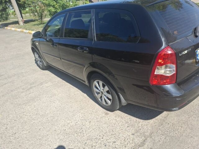 Черный Шевроле Лачетти, объемом двигателя 1.8 л и пробегом 300 тыс. км за 3000 $, фото 3 на Automoto.ua