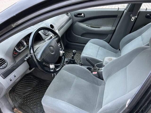 Черный Шевроле Лачетти, объемом двигателя 1.6 л и пробегом 200 тыс. км за 1450 $, фото 8 на Automoto.ua