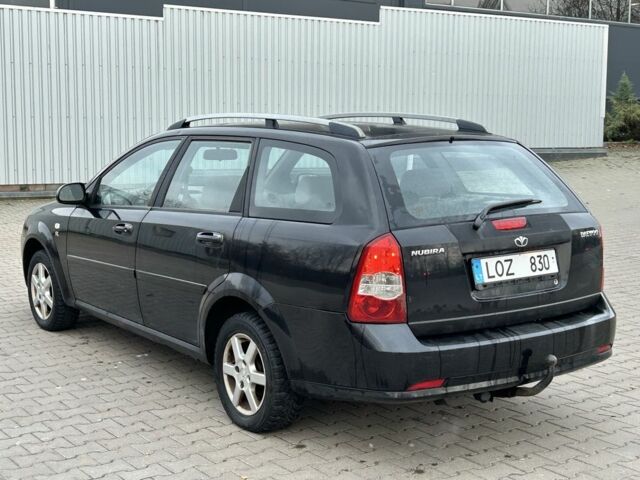 Черный Шевроле Лачетти, объемом двигателя 1.6 л и пробегом 200 тыс. км за 1450 $, фото 2 на Automoto.ua