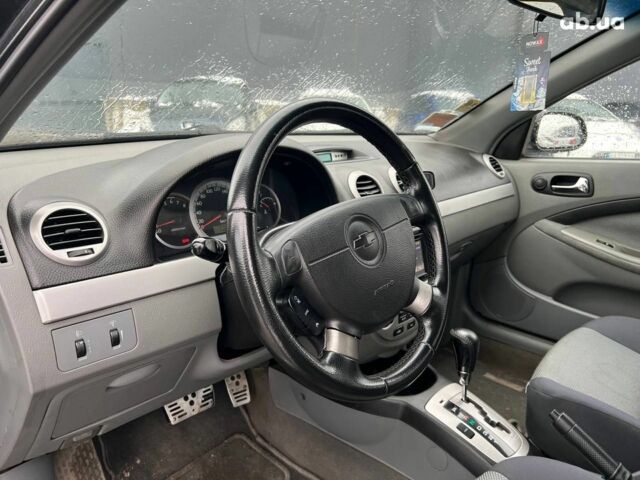 Черный Шевроле Лачетти, объемом двигателя 1.8 л и пробегом 293 тыс. км за 4190 $, фото 30 на Automoto.ua