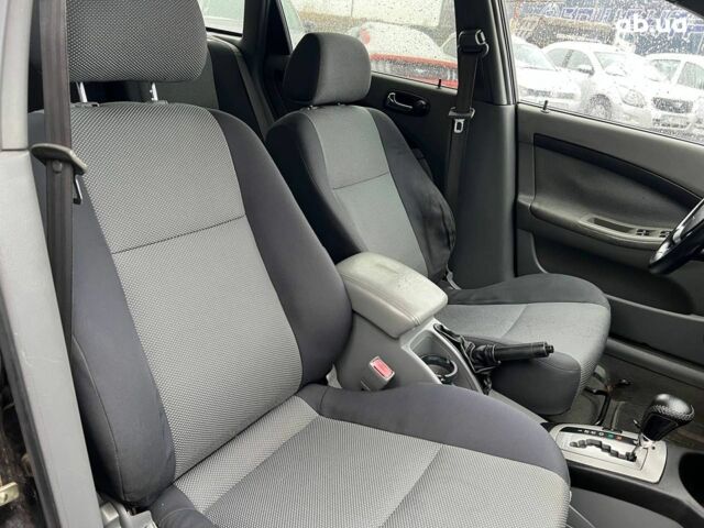 Черный Шевроле Лачетти, объемом двигателя 1.8 л и пробегом 293 тыс. км за 4190 $, фото 35 на Automoto.ua