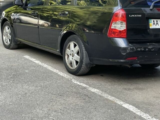 Черный Шевроле Лачетти, объемом двигателя 1.8 л и пробегом 334 тыс. км за 3600 $, фото 1 на Automoto.ua