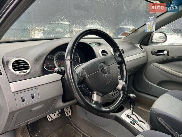 Черный Шевроле Лачетти, объемом двигателя 1.8 л и пробегом 293 тыс. км за 4190 $, фото 30 на Automoto.ua