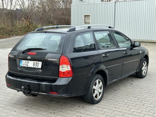 Черный Шевроле Лачетти, объемом двигателя 1.6 л и пробегом 200 тыс. км за 1450 $, фото 4 на Automoto.ua