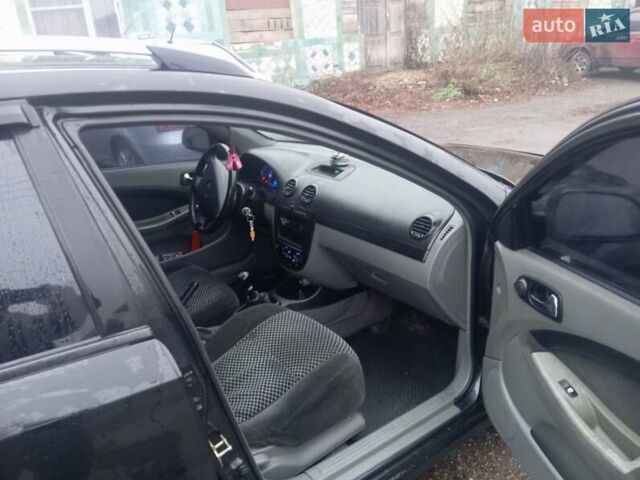 Черный Шевроле Лачетти, объемом двигателя 1.8 л и пробегом 230 тыс. км за 4350 $, фото 7 на Automoto.ua