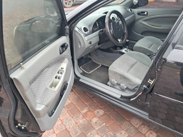 Черный Шевроле Лачетти, объемом двигателя 1.8 л и пробегом 190 тыс. км за 4300 $, фото 15 на Automoto.ua