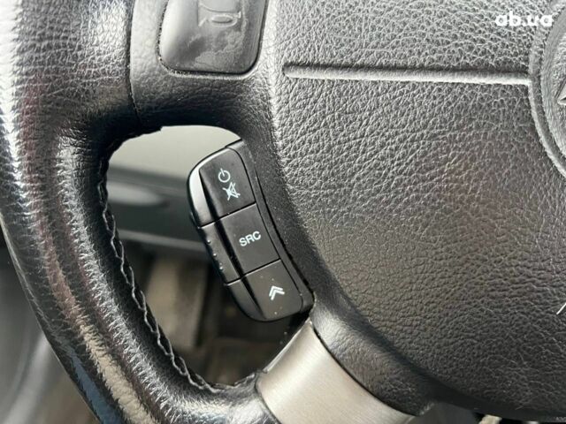 Черный Шевроле Лачетти, объемом двигателя 1.8 л и пробегом 293 тыс. км за 4190 $, фото 18 на Automoto.ua