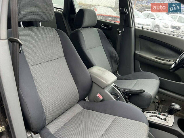 Черный Шевроле Лачетти, объемом двигателя 1.8 л и пробегом 293 тыс. км за 4190 $, фото 35 на Automoto.ua