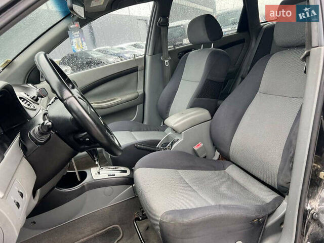 Черный Шевроле Лачетти, объемом двигателя 1.8 л и пробегом 293 тыс. км за 4190 $, фото 31 на Automoto.ua