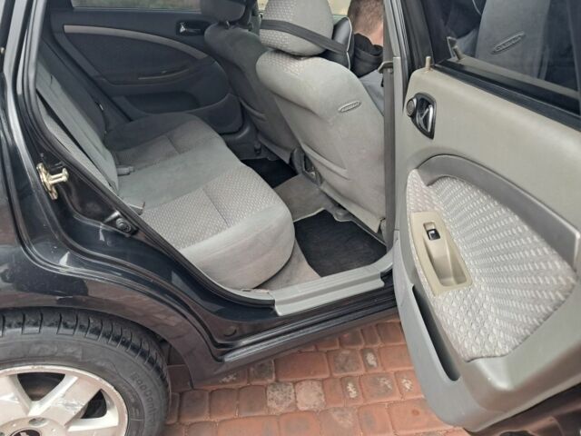 Черный Шевроле Лачетти, объемом двигателя 1.8 л и пробегом 190 тыс. км за 4300 $, фото 13 на Automoto.ua