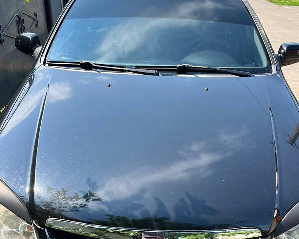 Черный Шевроле Лачетти, объемом двигателя 1.8 л и пробегом 188 тыс. км за 4500 $, фото 2 на Automoto.ua