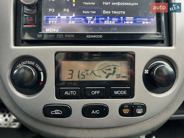 Черный Шевроле Лачетти, объемом двигателя 1.8 л и пробегом 293 тыс. км за 4190 $, фото 24 на Automoto.ua