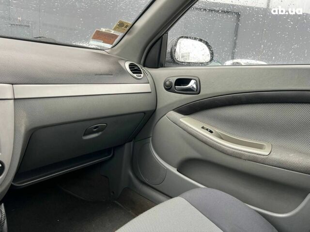 Черный Шевроле Лачетти, объемом двигателя 1.8 л и пробегом 293 тыс. км за 4190 $, фото 26 на Automoto.ua