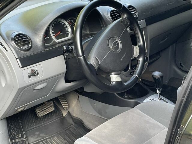 Черный Шевроле Лачетти, объемом двигателя 1.8 л и пробегом 334 тыс. км за 3600 $, фото 3 на Automoto.ua