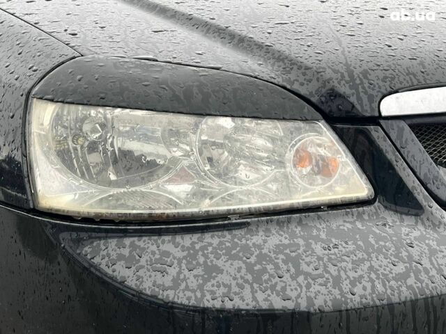 Черный Шевроле Лачетти, объемом двигателя 1.8 л и пробегом 293 тыс. км за 4190 $, фото 12 на Automoto.ua