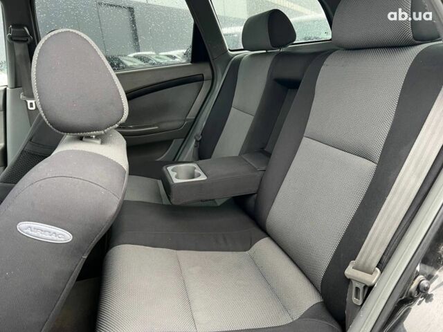 Черный Шевроле Лачетти, объемом двигателя 1.8 л и пробегом 293 тыс. км за 4190 $, фото 33 на Automoto.ua