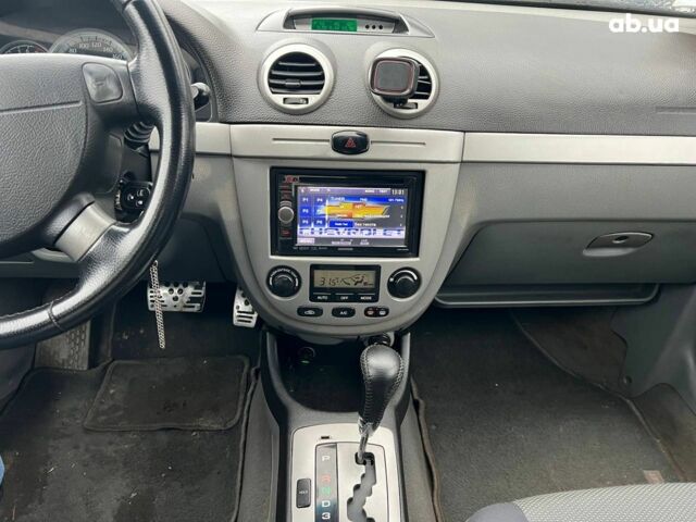 Черный Шевроле Лачетти, объемом двигателя 1.8 л и пробегом 293 тыс. км за 4190 $, фото 20 на Automoto.ua